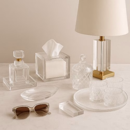 Custom glass and acrylic tray for hospitality bottle display in luxury hotel rooms.